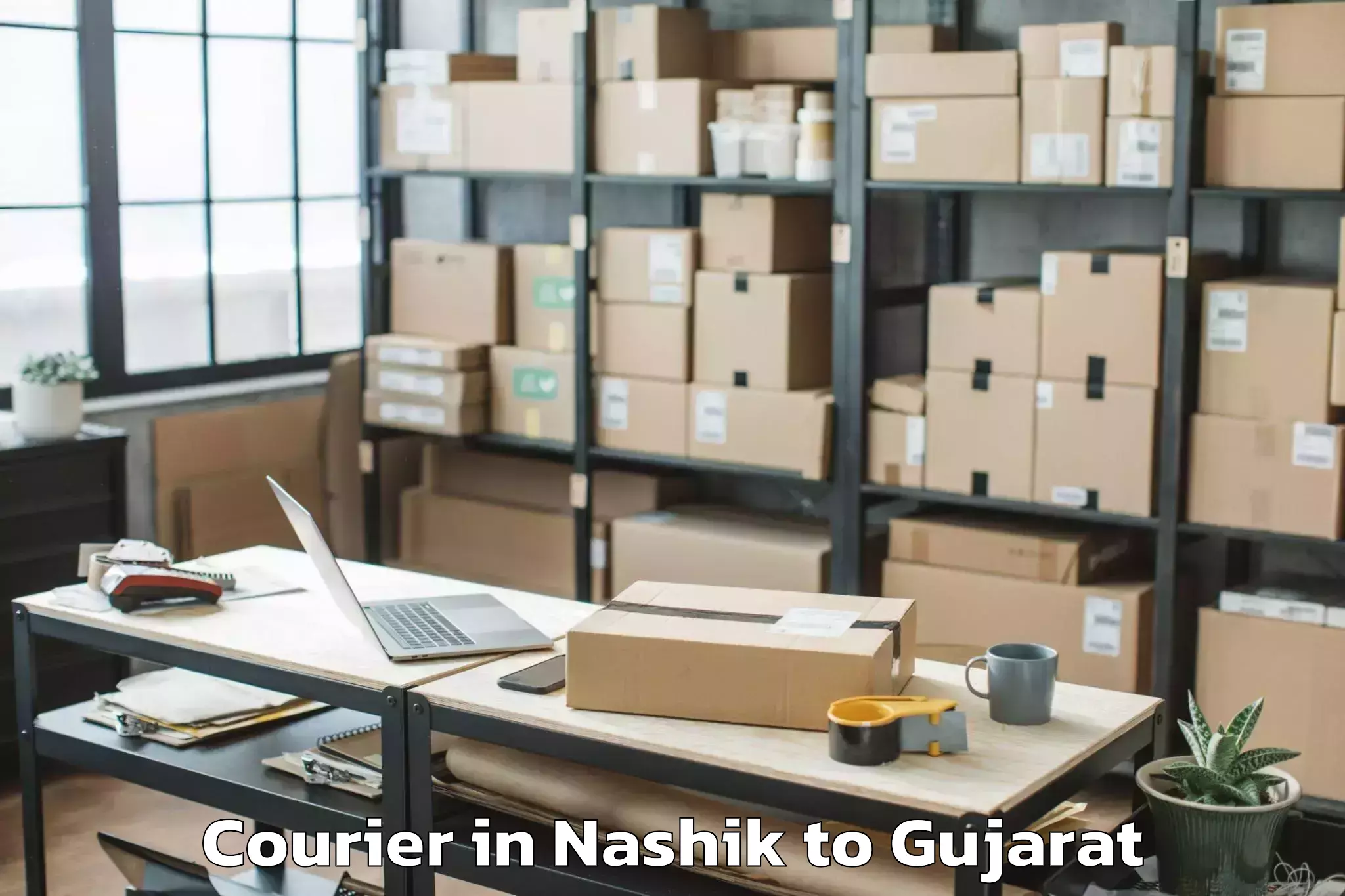 Book Nashik to Wankaner Courier Online